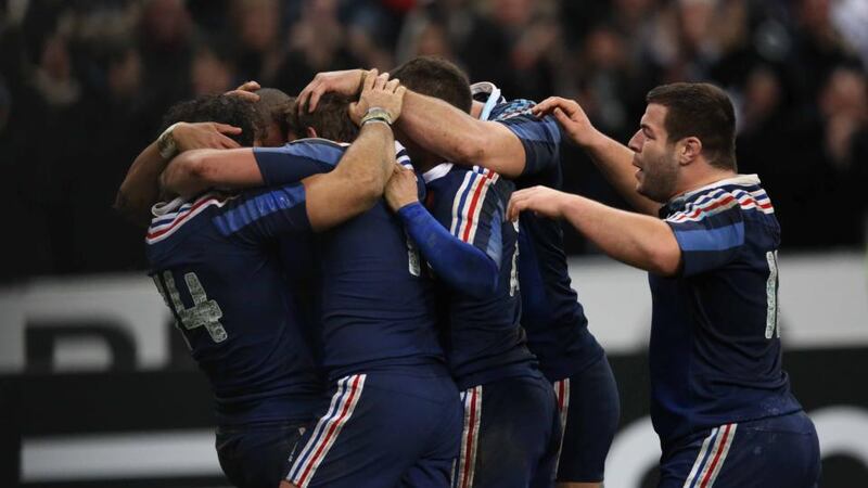 Gael Fickou celebrates his try with his teammates. Photograph: Billy Stickland/Inpho