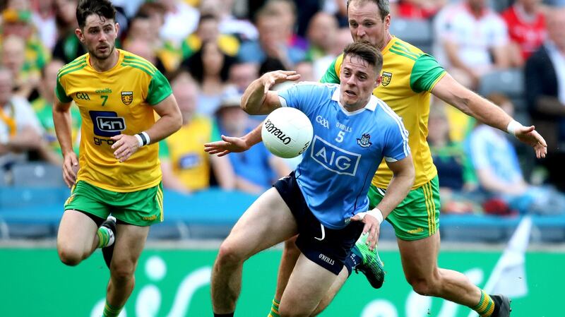 Donegal’s Michael Murphy in action against Brian Howard of Dublin during the All-Ireland SFC quarter-final Super 8 game at Croke Park. Photograph: Bryan Keane/Inpho