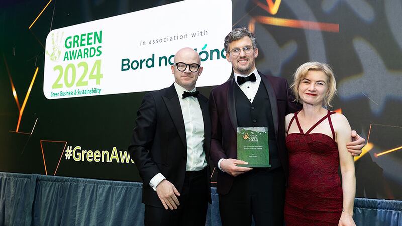 Shane Kelly, corporate relations director for Ireland, Diageo, presents the green tourism and entertainment award to Paul Coote and Louise McCormack, Hotel Doolin