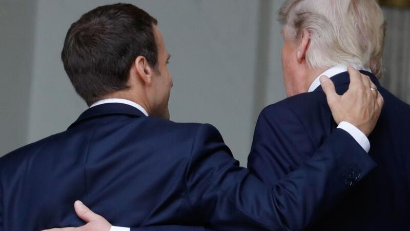 Bonhomie: President Macron and President Trump in Paris on Thursday. Photograph: Patrick Kovarik/AFP/Getty