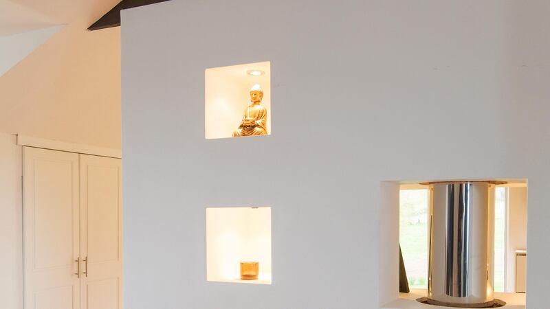 The kitchen extension, which is warmed by a solid fuel stove, was designed by Martin Noone