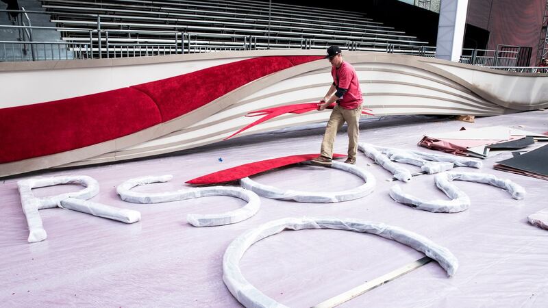 A worker displays the wrapped letters spelling “OSCARS” as preparations for the 91st annual Academy Awards ceremony get underway in Hollywood. Photograph: EPA