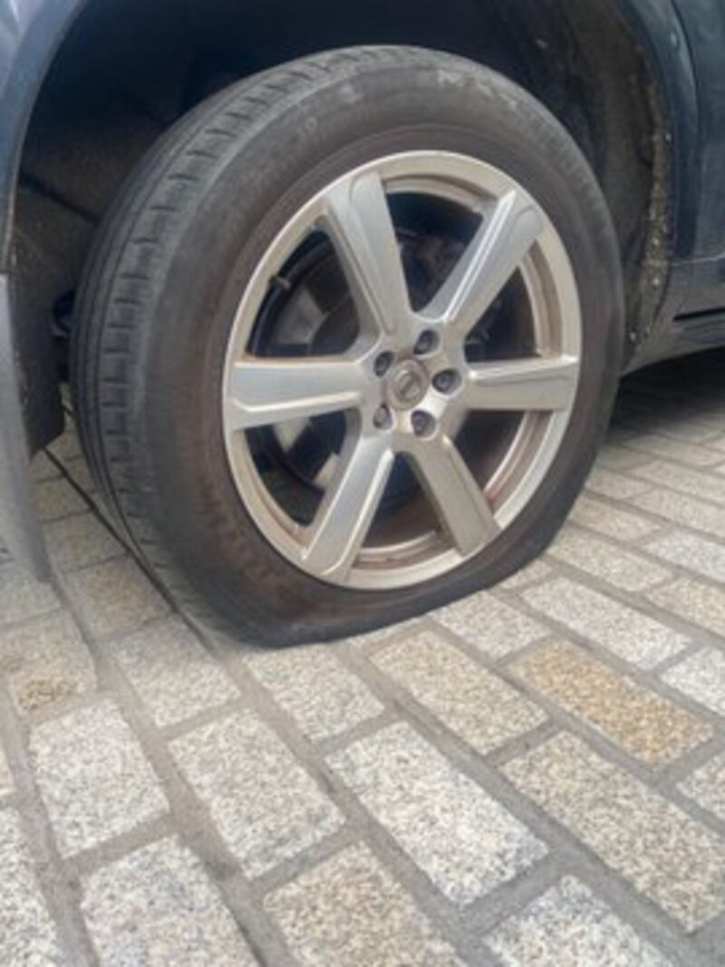 TD Neale Richmond shared an image of a deflated tyre
