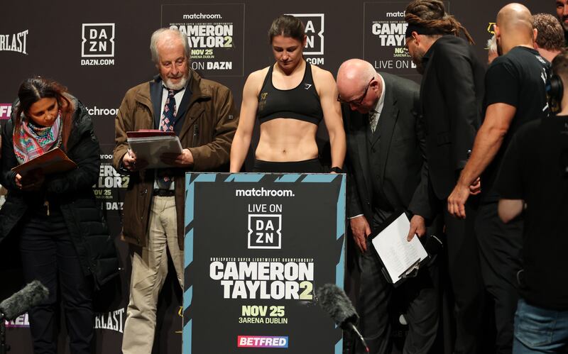 Katie Taylor weighs in ahead of her IBF, IBO, WBA, WBC and WBO World Super Lightweight Title fight against Chantelle Cameron. Photograph: James Chance/Getty