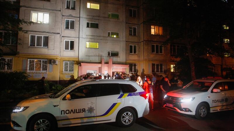 Ukrainian police cars stand in front of the entrance to the home of Russian opposition journalist Arkady Babchenko in Kiev, Ukraine.  Babchenko, who lived in Ukraine, was shot  in his Kiev home by three shots to his back and died from his wounds. Photograph:  EPA/Stepan Franko