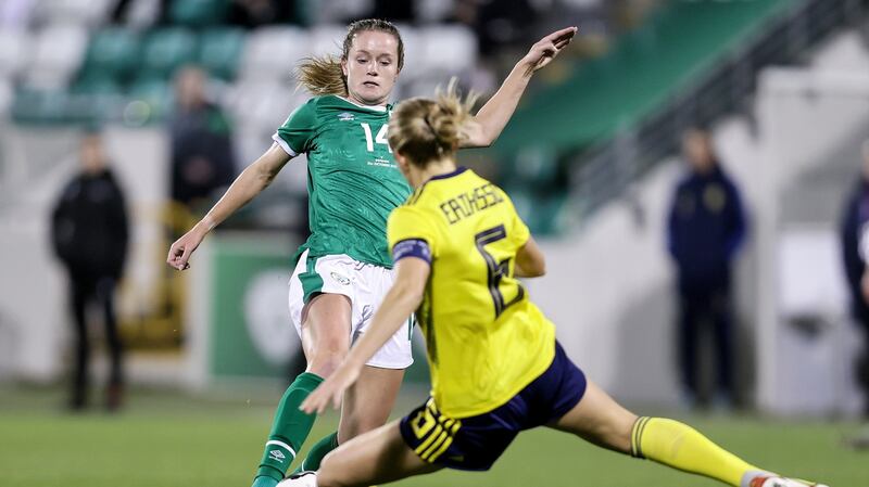 Ireland’s Heather Payne is challenged by  Magdalena Eriksson of Sweden during the Women’s World Cup qualifier in Tallaght. Photograph: Laszlo Geczo/Inpho