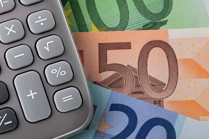 Calculator with euro notes. Tax and pensions. Photograph: iStock