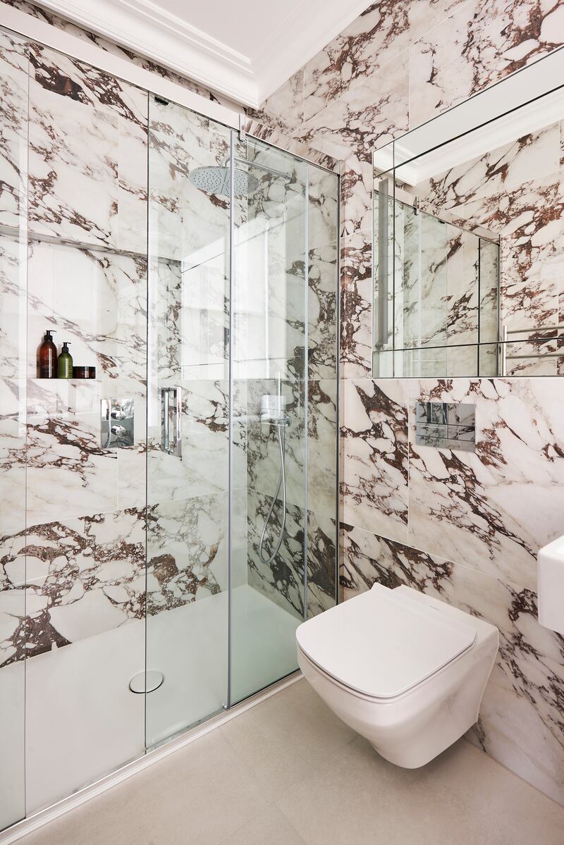 Create extra space in your bathroom with underfloor heating and a recessed shower shelf for storage. Photograph: matki.co.uk