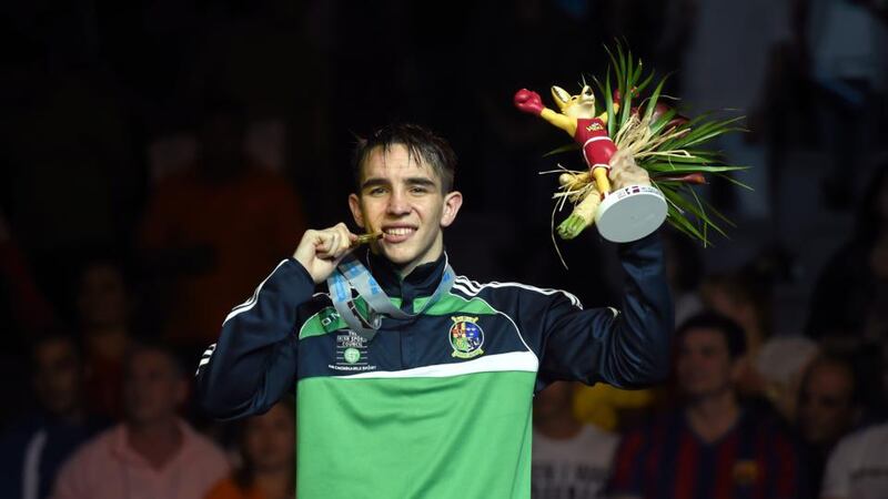 Michael Conlan celebrates with his gold medal. Photo: Paul Mohan / SPORTSFILE