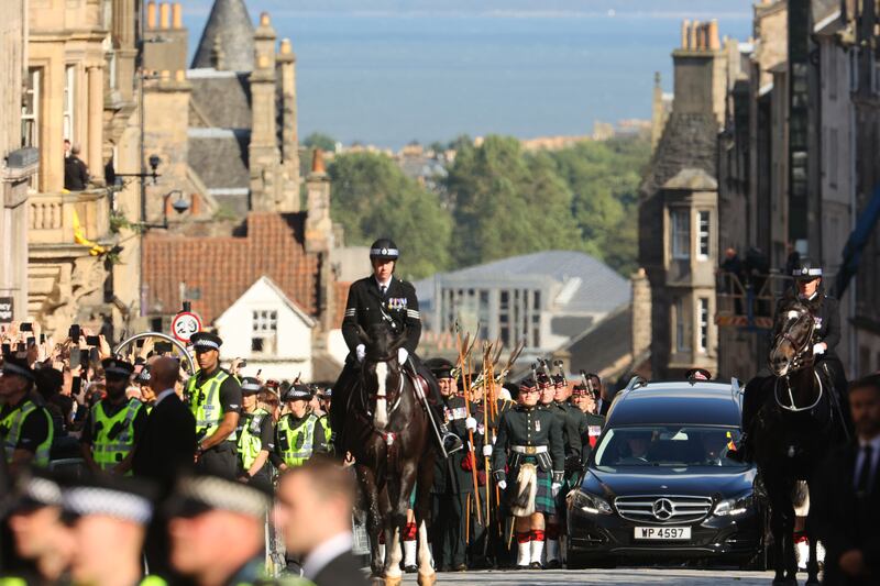 King Charles III and members of the royal family join the procession of Queen Elizabeth's coffin from the Palace of Holyroodhouse to St Giles' Cathedral, Edinburgh on Monday. Photograph: Mundo McLeod/Guardian