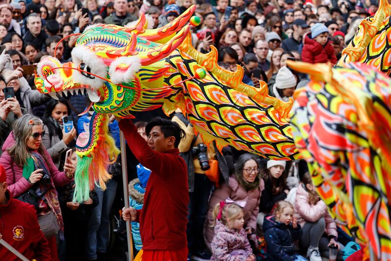 Crowds look on as the new lunar year is ushered in at Meeting House Square, Temple Bar, Dublin. Photograph: Nick Bradshaw