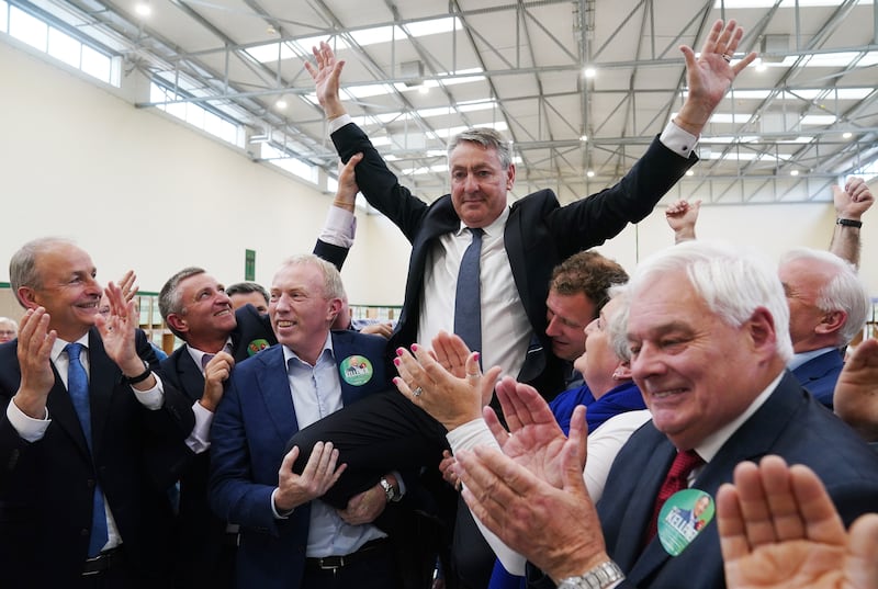 Fianna Fáil's Billy Kelleher (centre) celebrates his election as an MEP, at Nemo Rangers GAA club in Cork, Ireland: Brian Lawless/PA Wire