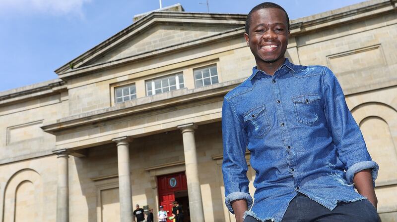 Imani Tutu  at the historic Cavan Courthouse. Imania is studying law  at  University College Cork but his home town is Cavan. Photograph:   Lorraine Teevan