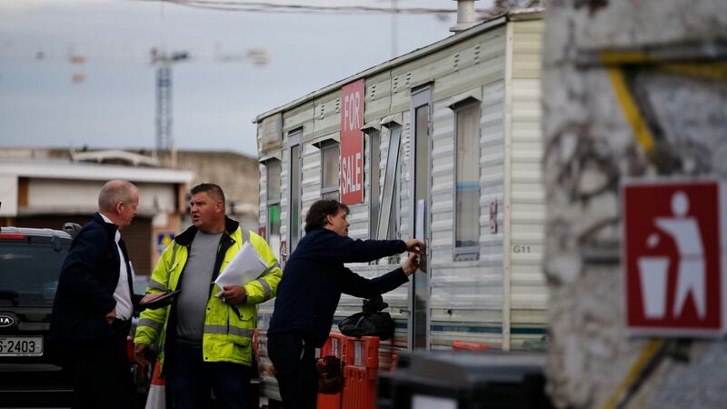 The scene off Prussia Street this afternoon as notices were posted on the mobile homes. Photograph: Nick Bradshaw