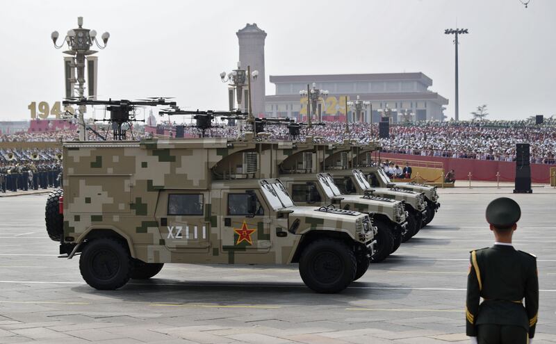 Drones carried by armoured vehicles. Photograph: EPA