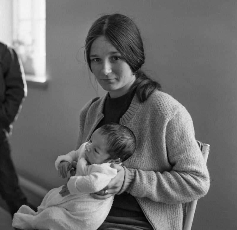 A refugee woman and her baby from Ballymurphy at St Mary’s College in 1972. Photograph: John Carlos/The Connacht Tribune