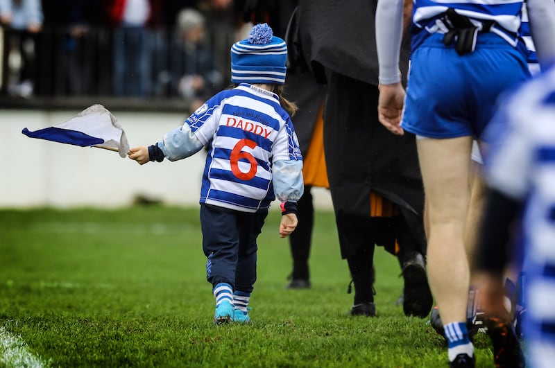 Isla Doyle, daughter of Naas captain Eoin Doyle in the pre match parade. Photograph: Lorraine O’Sullivan/Inpho