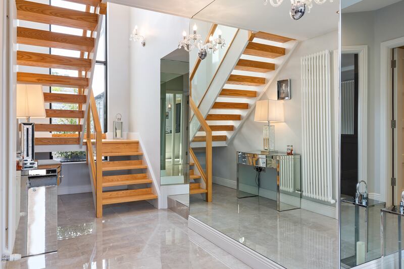 All rooms lie off a central double height hall. All photographs: Keith Owens