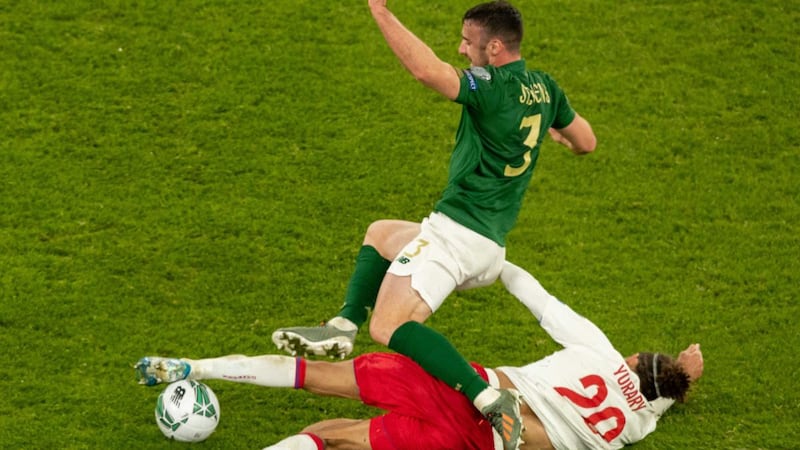 Republic of Ireland’s Enda Stevens is tackled by  Yussuf Poulsen of Denmark during the Euro 2020 qualifier at the Aviva stadium. Photograph:  Morgan Treacy/Inpho