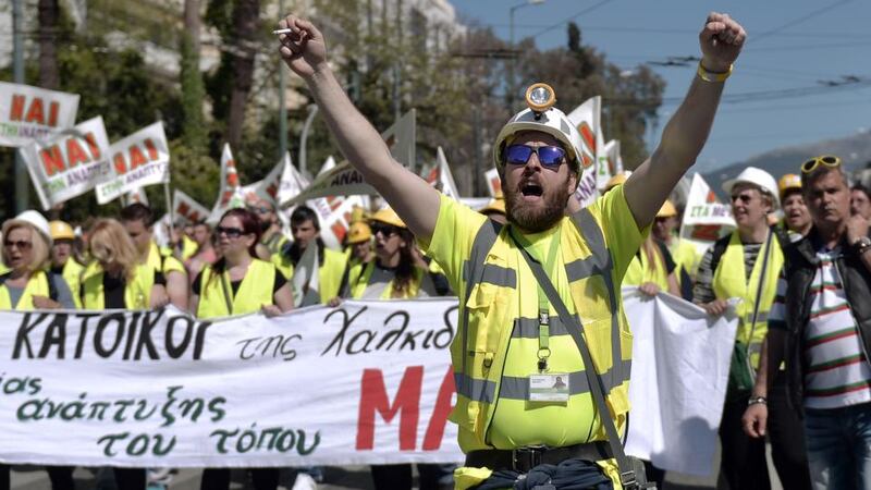 Thousands of miners with their families and supporters protesting in Athens yesterday. Photograph: Getty Images