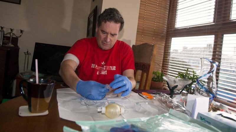 Dan Boyle self-administering his antibiotics. Photograph: Michael Mac Sweeney/Provision