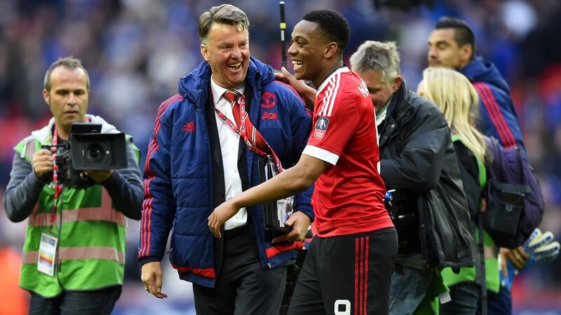 Louis van Gaal with Anthony Martial after Manchester United’s late FA Cup semi-final win over Everton at Wembley. Photograph: Mike Hewitt/Getty