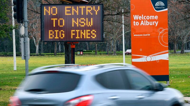 A sign in the southern New South Wales (NSW) at the border city of Albury. Photograph: William West/ AFP/Getty