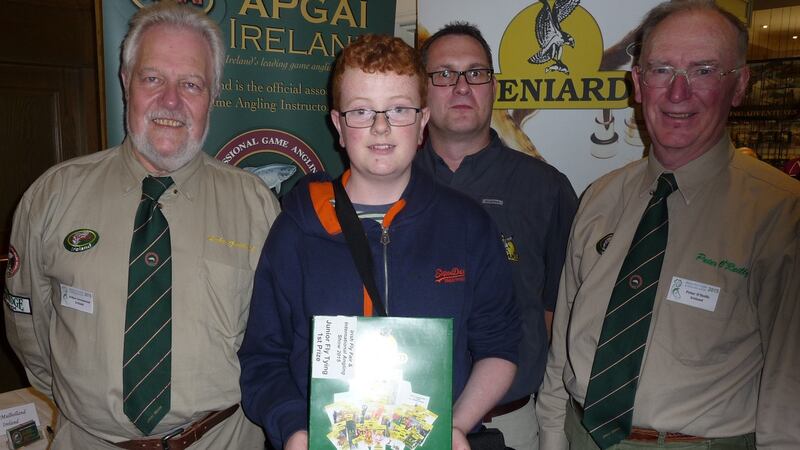 Fergal Collery, winner of the youth fly dressing competition at the Irish Fly Fair in Galway, with Arthur Greenwood, Peter Varney of sponsors Veniards and Peter O’Reilly.