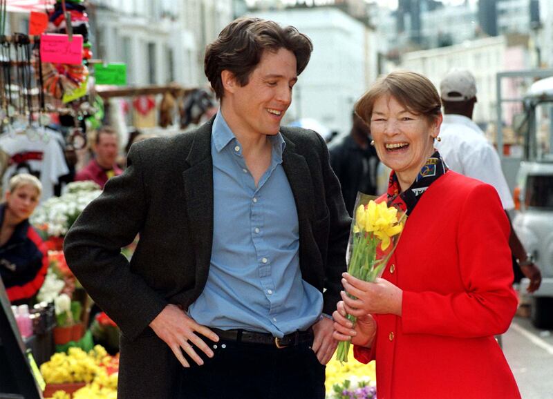 Hugh Grant with Glenda Jackson in London during a visit to the set of his film in Notting Hill in 1998. Photograph: Fiona Hanson/PA