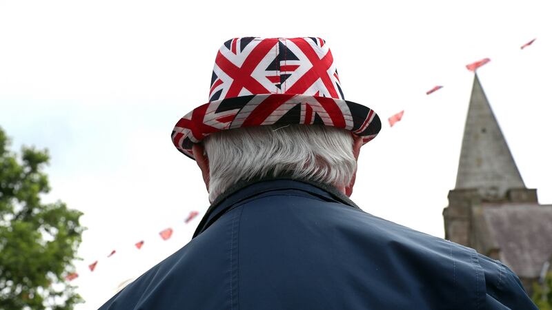 Watching the bands parade on the Shankill Road, Belfast today. Photograph: Stephen Davison