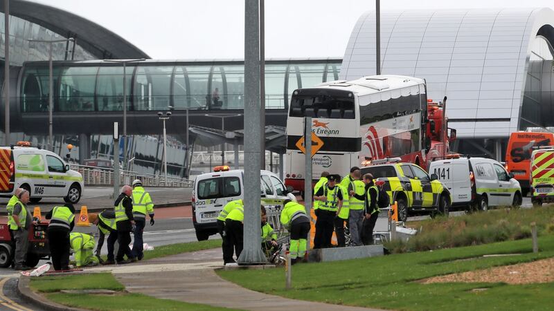 A Bus Éireann bus is removed from the scene outside T2 at Dublin Airport. Photograph: Collins