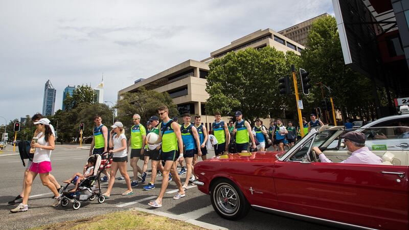 Ireland’s International Rules squad walk to training at Langley Park in Perth. Photograph:  Tommy Dickson/Inpho