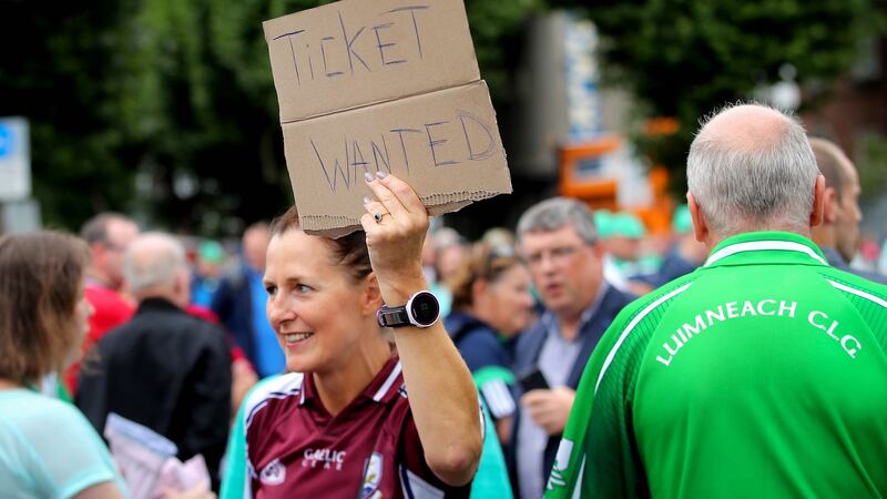 A Galway fan searching for a ticket ahead of the All-Ireland hurling final against Limerick in 2018. Photograph:  Ryan Byrne/Inpho