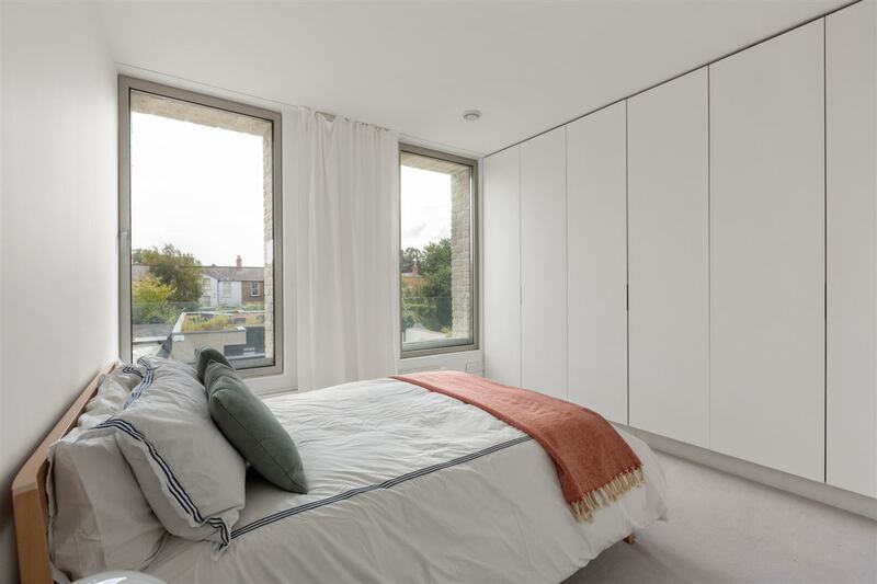 The property has three bedrooms on the first floor