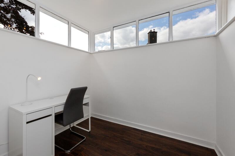 An office lies upstairs