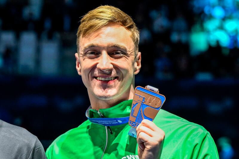 Ireland’s Shane Ryan celebrates with his bronze medal for the 50m backstroke at the World Short Course Championships in 2024. 
Photograph: Andrea Masini/Inpho