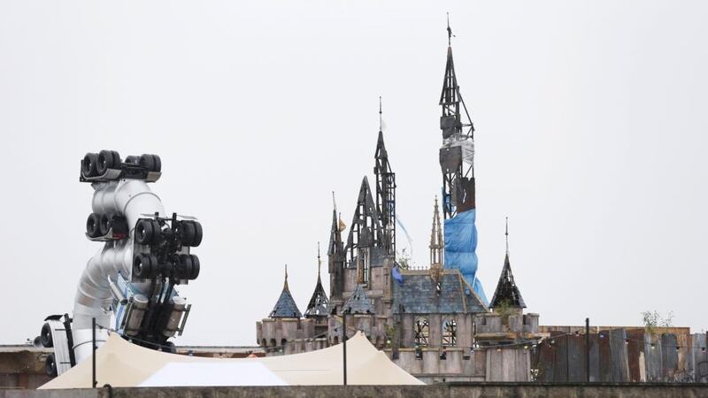Among the exhibits visitors will find a bus-mounted museum looking at the role of design in social control, and a portable cabin in the kids’ area offering “loans against your pocket money”.  Photograph: Suzanne Plunkett/Reuters