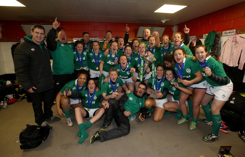 Lukasz Kirszenstein celebrates with the Ireland squad after winning the 2015 RBS Women's Six Nations. Photograph: Dan Sheridan/Inpho