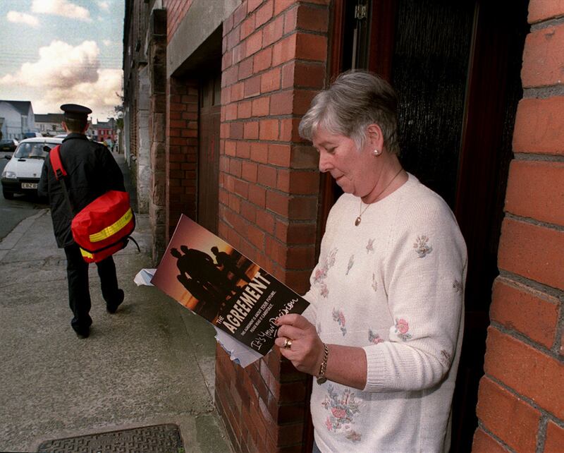 A member of the public in Northern Ireland getting a first glimpse of what the Belfast Agreement would entail back in 1998.
