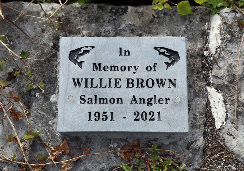 The memorial to salmon angler Willie Brown on the high bank beside the Corrib between the Salmon Weir Bridge and O'Brien's Bridge. Photograph: Joe O'Shaughnessy