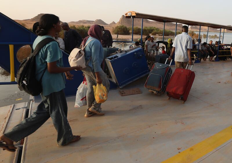 People  crossing the border from Sudan at Abu Simbel, southern Egypt, Photograph: Khaled Elfiqi/EPA