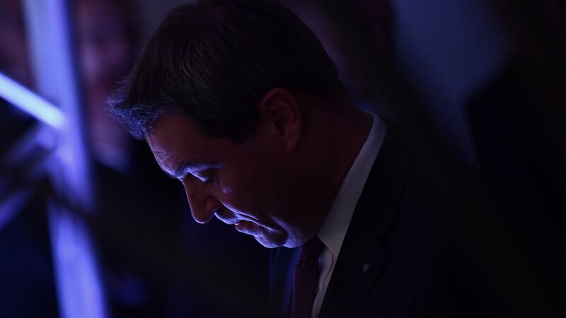 Bavaria’s state premier Markus Söder leaves the stage after speaking to supporters after first exit polls were announced  in Munich, Germany. Photograph: Peter Kneffel/dpa/AFP