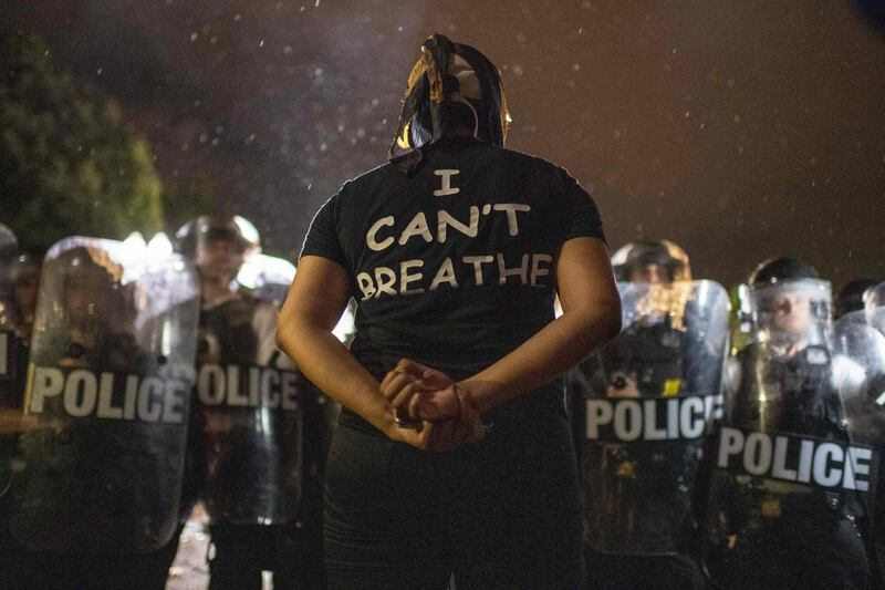 George Floyd killing: protesters face off with police outside the White House. Photograph: Eric Baradat/AFP via Getty