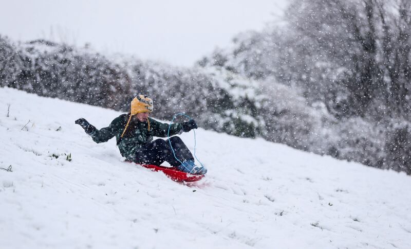 Beth Broderick from Milltown sleds down a hill. Photograph: Nick Elliott/INPHO