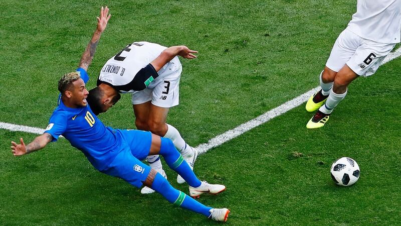 Neymar goes down in the box to earn a ’penalty’ that was overturned on VAR. Photograph: EPA