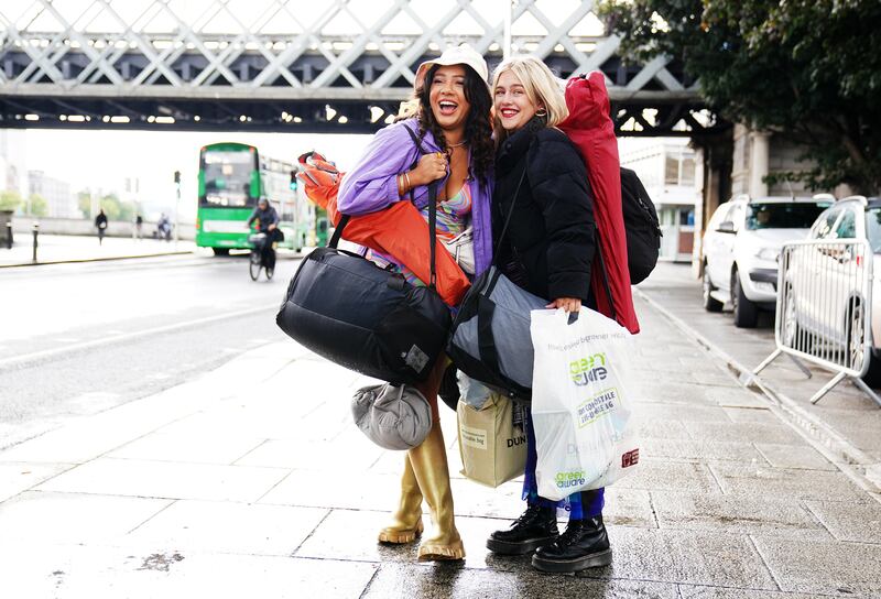 Amber Reilly and Cliodhna Cole arrive for a bus to Electric Picnic at the Customs House, Dublin. Photograph: Brian Lawless/PA