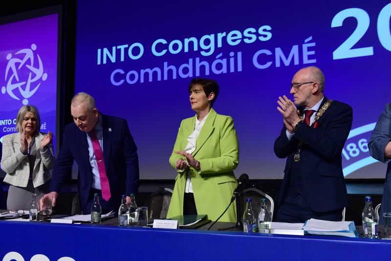 Norma Foley TD, Minister for Education joins in the aplause  given to John Boyle, General Secretary following his address to delegates at the INTO annual congress in Killarney yesterday.   Dorothy McGinley Vice President and John Driscoll President are also pictured. Photo: Moya Nolan