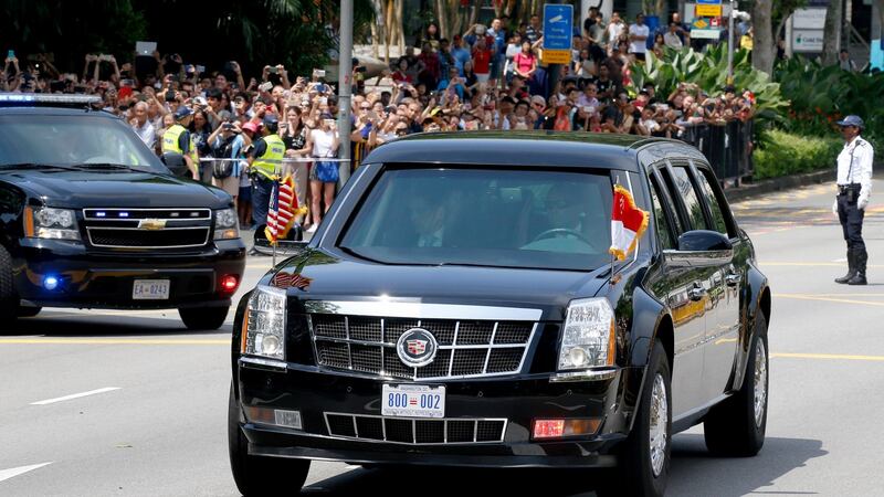 The car carrying US president Donald  Trump leaves the Istana Presidential Palace in Singapore  after his meeting with Singapore prime minister Lee Hsien Loong on Monday. Photograph: Lynn Bo Bo/EPA
