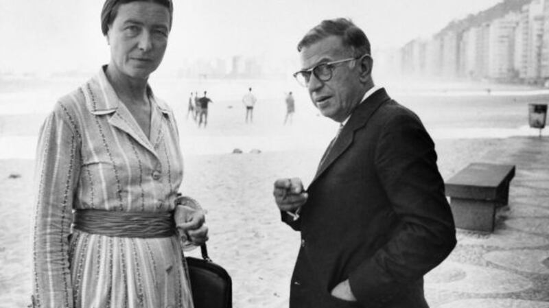 Existentialist philosophers Simone de Beauvoir and Jean-Paul Sartre enjoy the freedom of the beach in Rio in 1960. Photograph: STF/AFP/Getty