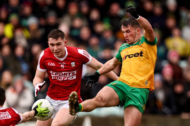 Cork's Luke Fahy with Donegal's Peadar Mogan during the league clash in Ballybofey. Photograph: Ben Brady/Inpho 